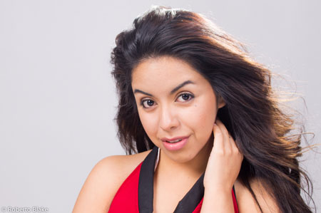 Visual Storytelling Figure 2: Notice the extra space to the left of the model in this image. This can give you some extra flexibility when incorporating this photo into a layout (and save you from having to fake more image area with Photoshop).