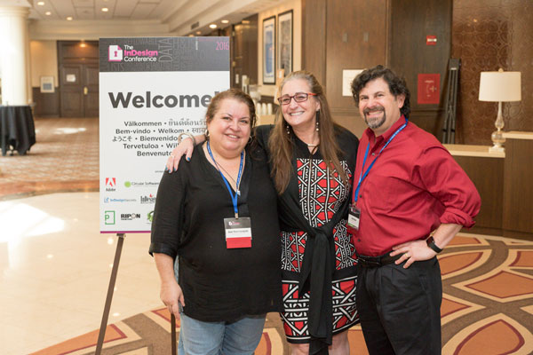 Over 400 attendees packed the conference rooms at the Sheraton Tysons Corner, while Marci Eversole (center) kept things running smoothly for everyone, including hosts Anne-Marie Concepción and David Blatner.