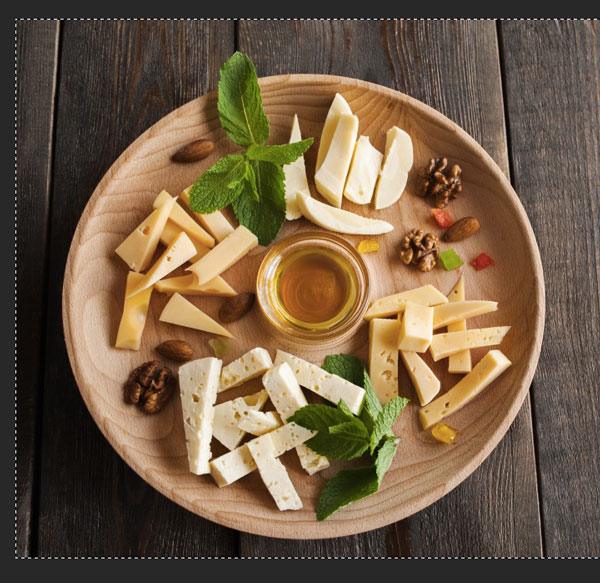 Photograph of cheese board selected in Photoshop