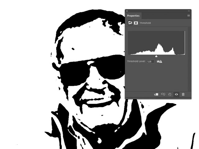 Smooth, black and white headshot of Stan Lee with Photoshop Threshold window