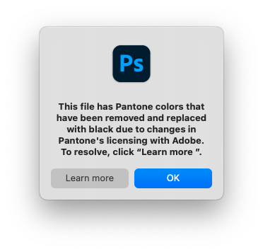 Modal dialog box in Photoshop says "This file has Pantone colors that have been removed and replaced with black due to changes in Pantone's licensing with Adobe. To resolve, click "learn more."