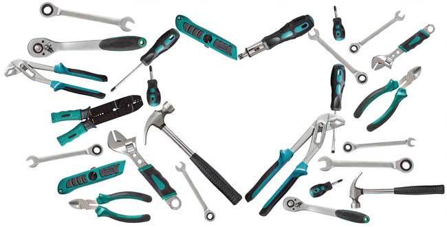 Set of tools arranged in the shape of a heart