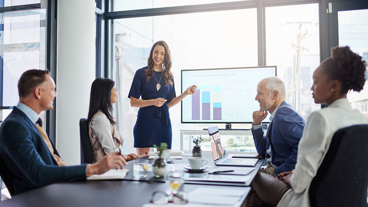 woman giving a presentation to a small business audience