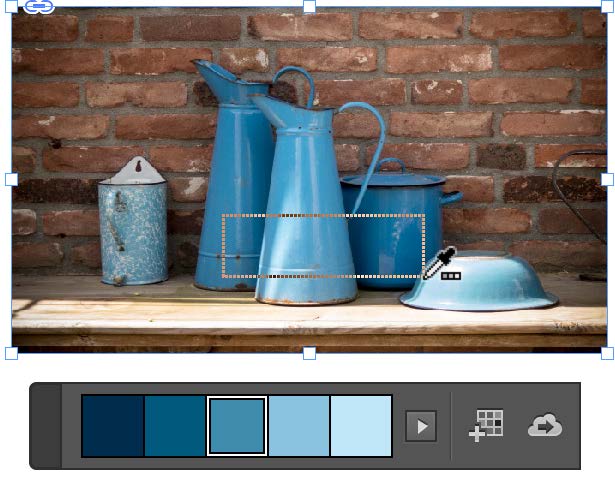 Same image as figure 20, but with color theme tool selecting a small rectangular area primarily of blue pitchers. Resulting color theme swatches are all shades of blue.
